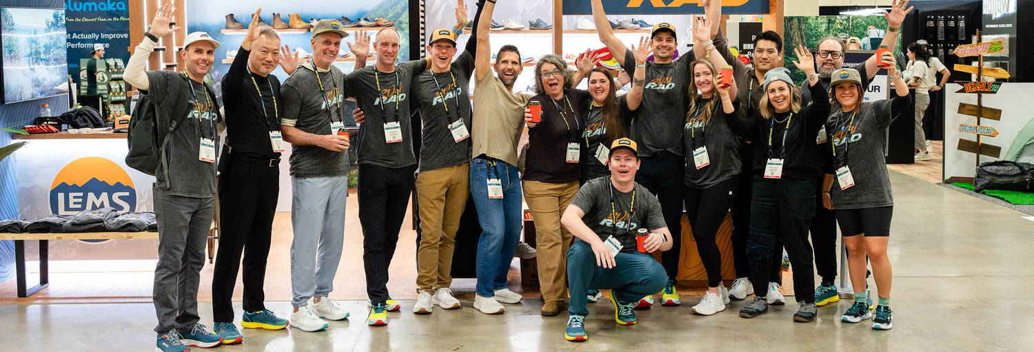 Lems team celebrating at a tradeshow