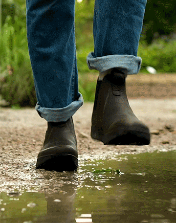 Chelsea Waterproof boot splashing in puddle